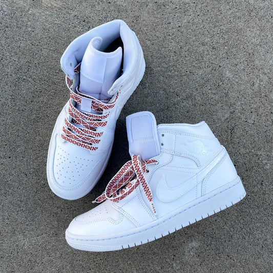 Nesia Originals Polynesian Tapa design shoelaces laced in all white Jordan 1's